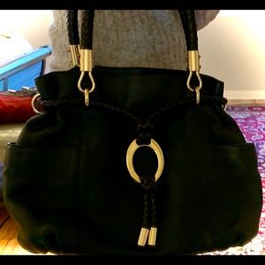 Michael Kors leather black bag with golden accents